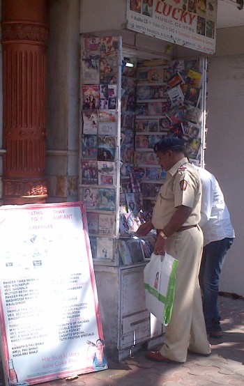 Cop at the pirate dvd shop.jpg